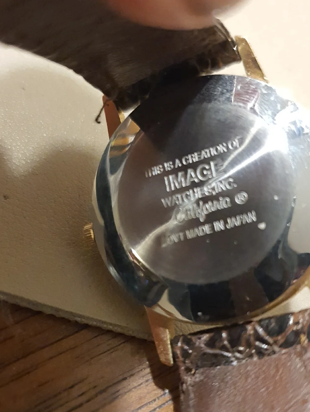 10/$20 Vtg Hatch & Kirk Inc Promo Goldtone/White Leather Men's Watch